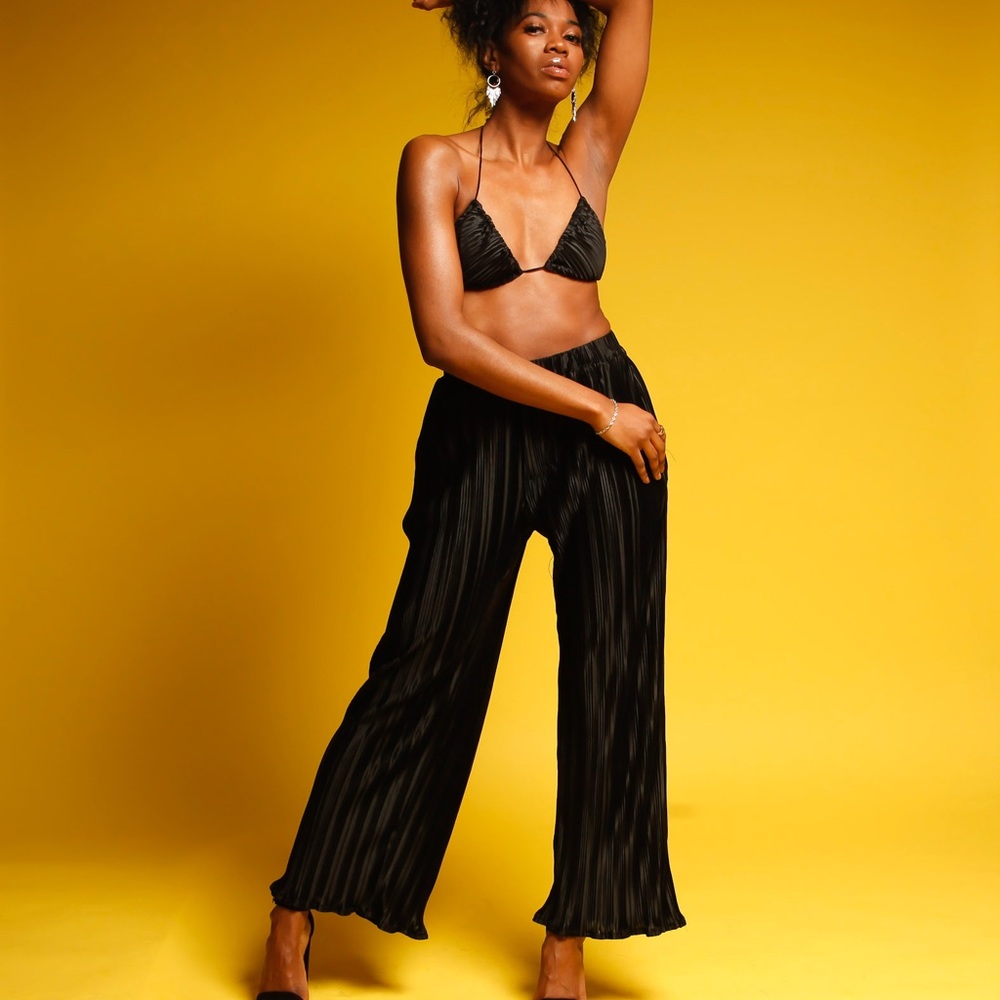 Black bikini top and ruched pants